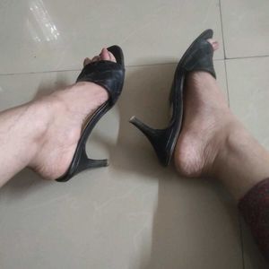 Chic Black Mules with sleek Heels