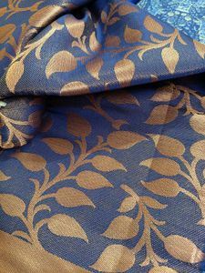 Elegant Blue Saree with Golden Leaf Motifs