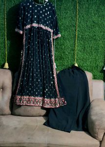 Beautiful embroidered Naira suit
