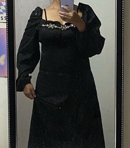 Elegant Black Dress with Embellished Neckline