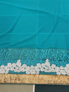 Beautiful Teal Blue Saree with Gold Border