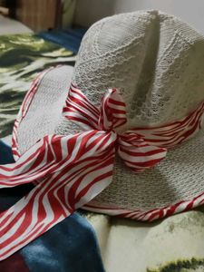 Stylish White Knit Hat with Red Ribbon