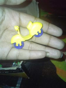 Vintage Toy Character with Wheels