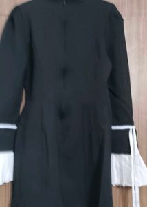 Chic Black Dress with White Details