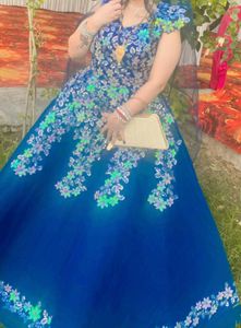 Beautiful Blue Clr Ball Gown With Very Heavy Flare