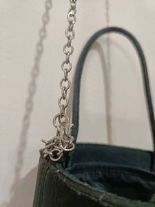 Rhinestone studded smiley face crossbody bag