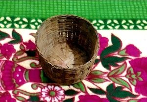 IT IS TWO WOODEN BASKETS......