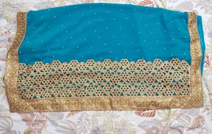 Teal Saree with Gold Border
