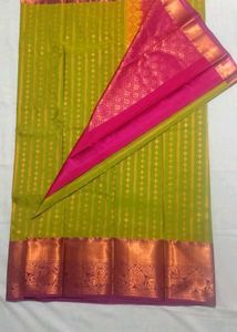 Vibrant Green Silk Saree with Pink Border