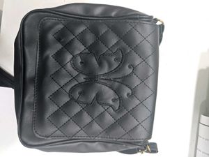 Stylish Quilted Black Crossbody Bag with Butterfly