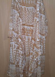 Green Embroidered Maxi Dress with golden jacket