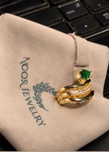 Elegant Emerald &amp; Diamond Ring