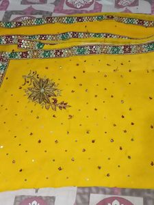 Elegant Yellow Saree with Embellishments