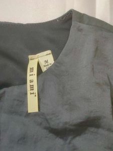 Sleek Grey Sleeveless Top with Pocket