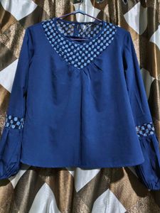Stylish Blue Top with Embellished Neckline