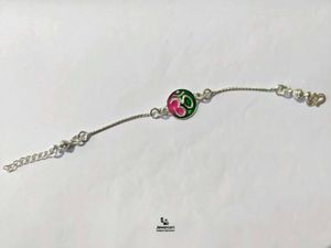 Elegant Enamel Pure Silver Rakhi