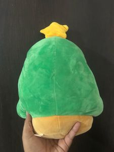Christmas tree character wearing a green hooded