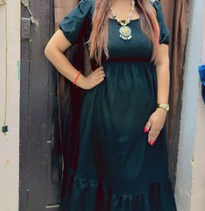 Elegant Black Dress with Statement Necklace