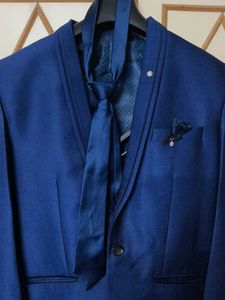 Men's Blue Suit with Tie and Pocket Square