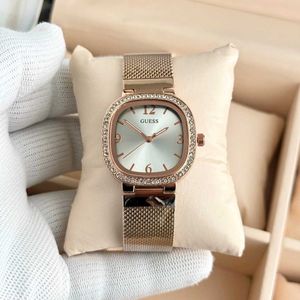 Gold Guess Watch with Crystal Bezel