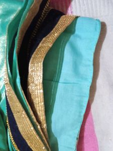 Stunning Teal Saree with Gold Border