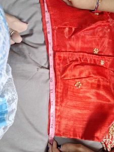 Red blouse with golden and pearl ambroidery