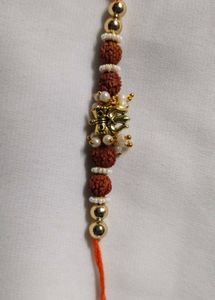 Elegant Rakhi with Trishul Charm