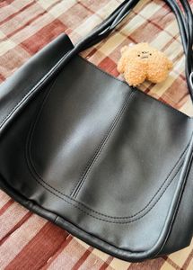 Stylish Black Hobo Bag with Charm