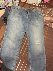 Light Wash Distressed Denim Jeans