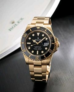 Luxury Gold &amp; Green Rolex Watch