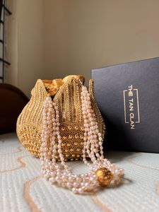 Elegant Gold Embellished Potli Bag