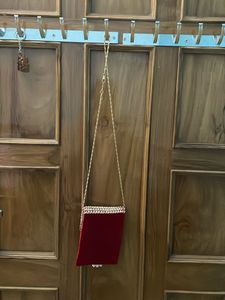 Embellished Clutch with Pearl Tassels
