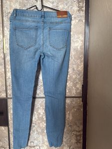 Light Wash Distressed Skinny Jeans