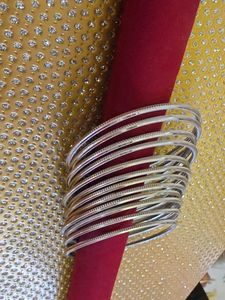 12 Set of Elegant Silver Bangles