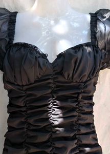 713. Chic Black Ruched Mini Dress