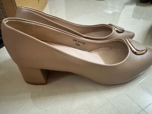 Chic Beige Block Heels with Gold Accent
