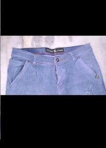 Distressed Blue Denim Jeans