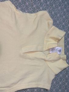 Sleeveless Yellow Polo top