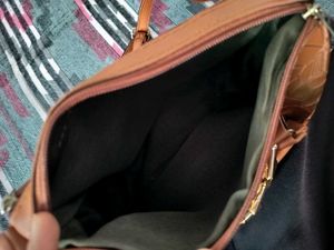 sale on Stylish Textured Brown sling Bag