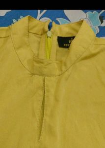 Chic Yellow Top with Striped Sleeves