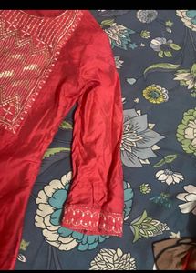 Elegant Red Kurta with Embellished Neckline