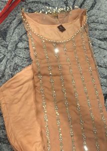 Elegant Peach Kurta with Embellishments