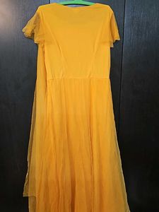 Beautiful Yellow Partywear Gown With Net Pallu