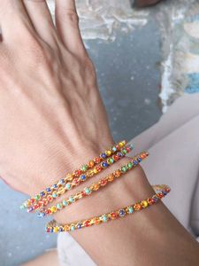Gold Tone Bangles with Colorful Beads