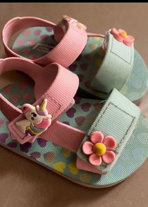 Three pair of kids footwear