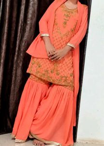 Exquisite Peach Embellished Sharara Set
