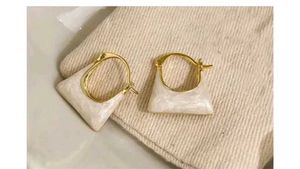 Chic White & Gold Geometric Earrings