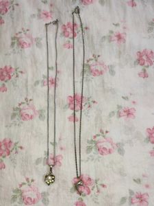Two Silver Tone Necklaces - Heart & Dolphin