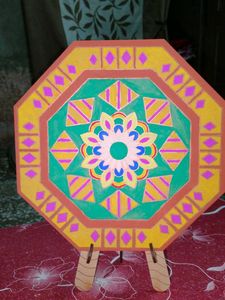 beautiful mandala art with wooden stand
