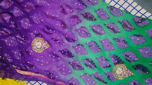 Vibrant Purple Saree with Leaf Motifs